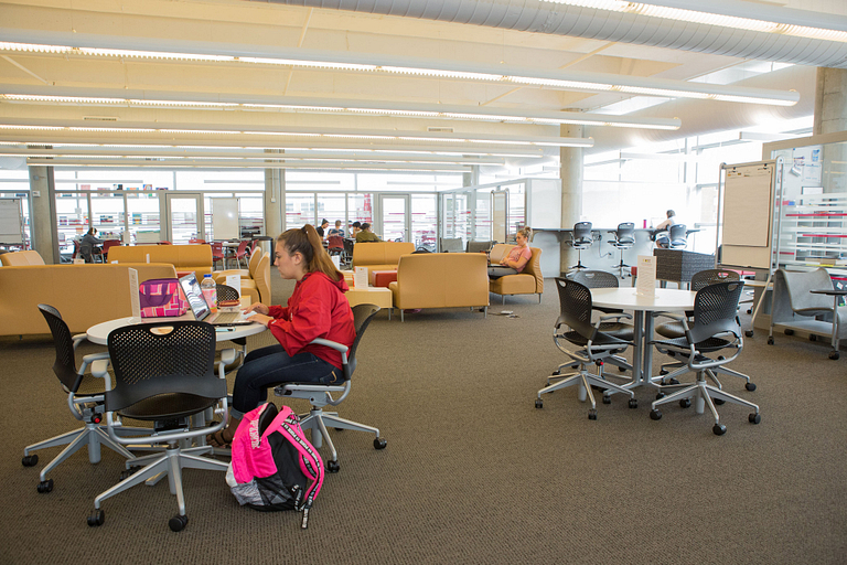 The Cube is a wide-open space on the third level of the Campus Center, with tables and chairs.