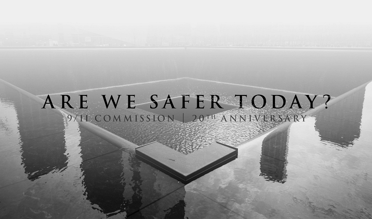 'Are We Safer Today' text over World Trade Center memorial