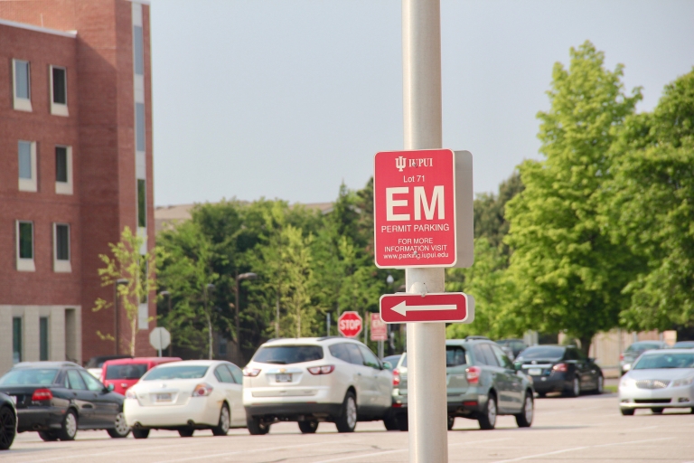 An employee parking sign in an IUPUI lot
