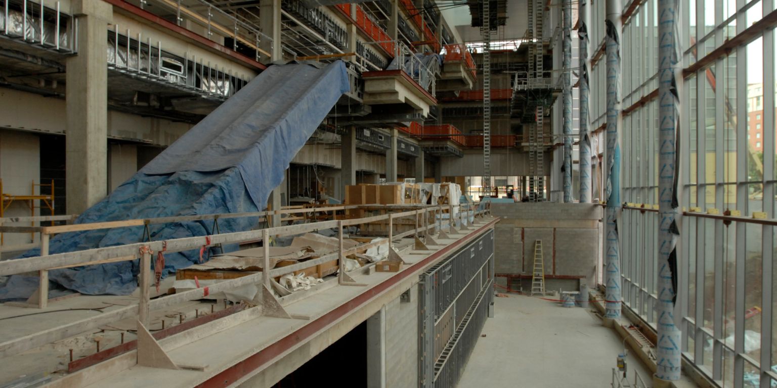 Unfinished escalators in the Campus Center during construction of the building.