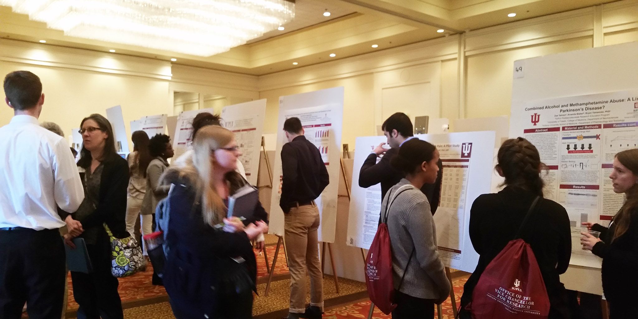 Students and their posters.