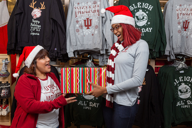 Students exchange a present.