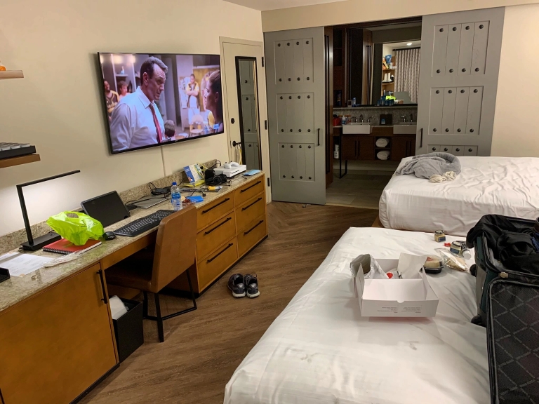 a hotel room with two beds