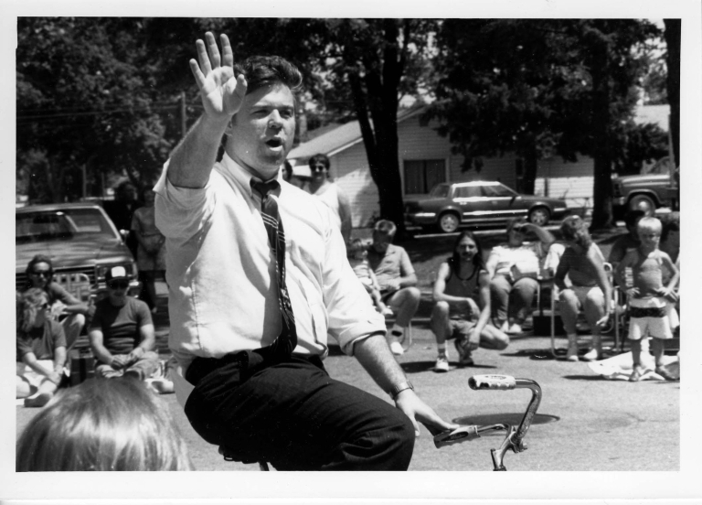 Congressman Jim Jontz on bicycle, 1990