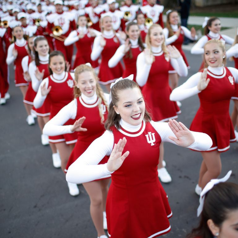 Red steppers in the homecoming parade.