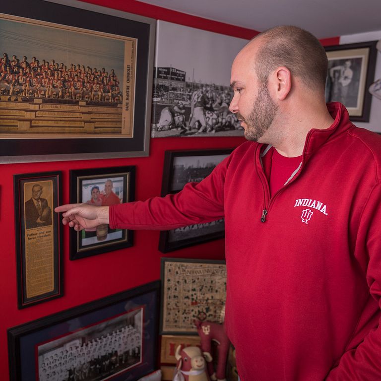 Brett White showing his memorabilia. 