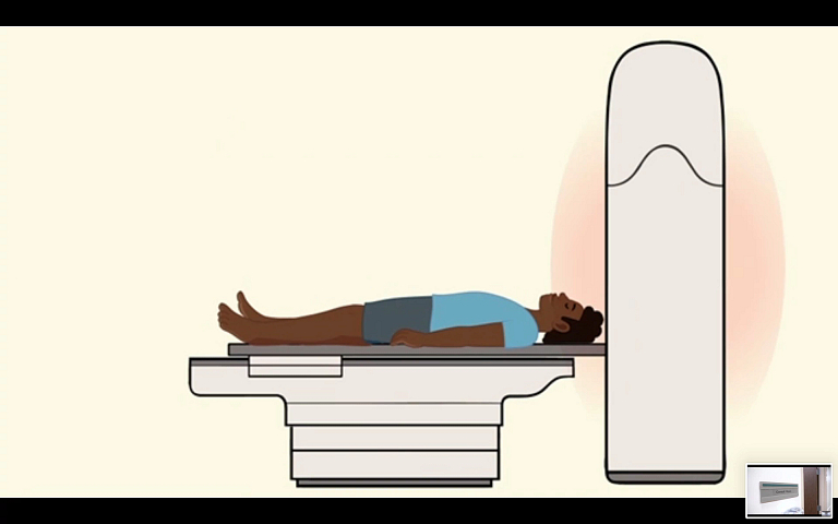 A animation still depicting a patient entering an MRI machine