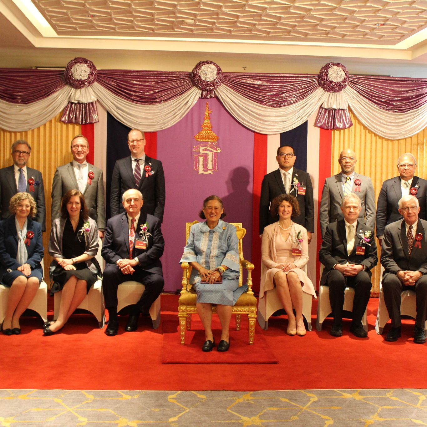 Members of the IU delegation pose for a photo with Princess Sirindhorn.