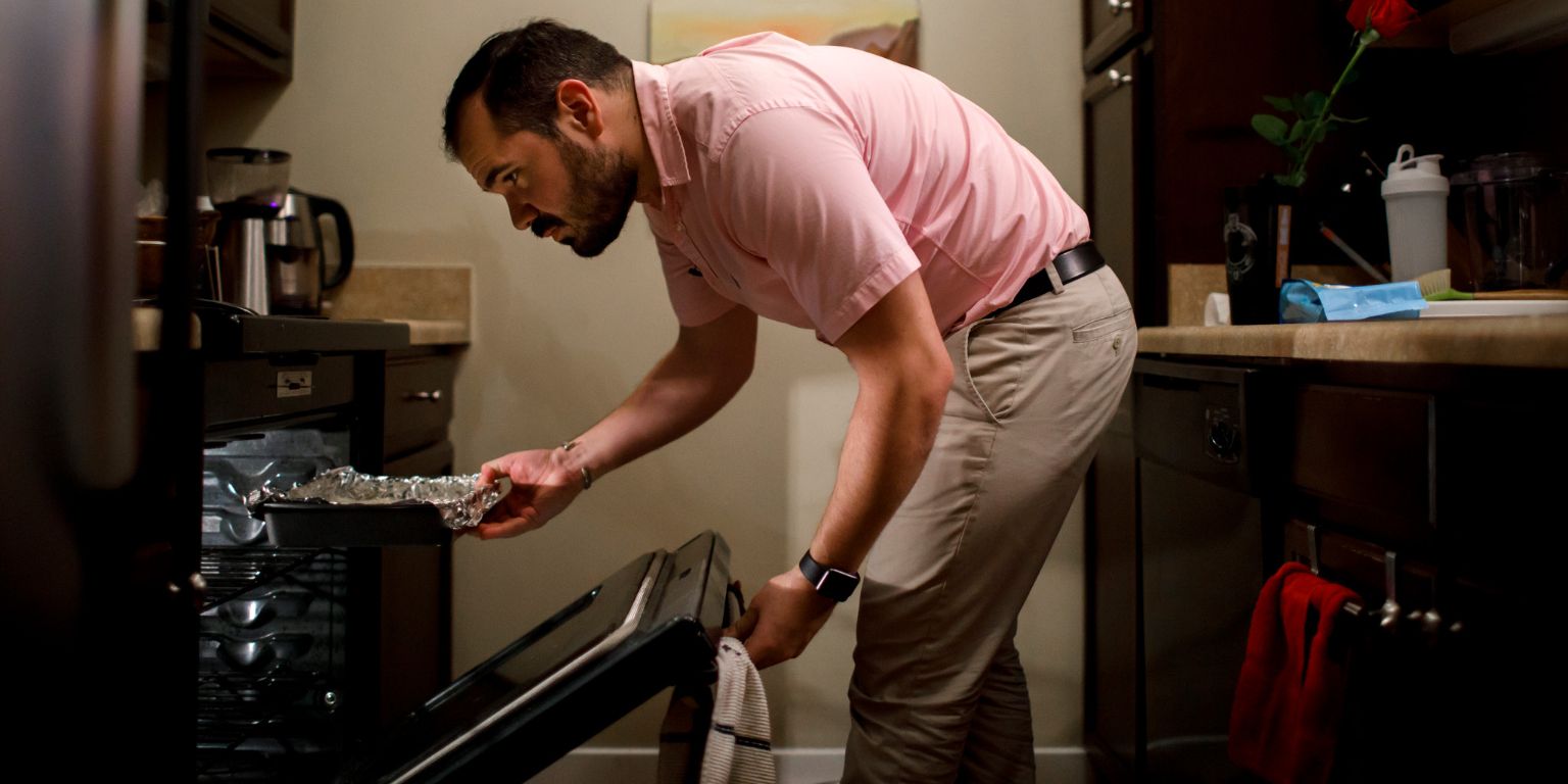 Mario Arango puts a stick of butter in his oven