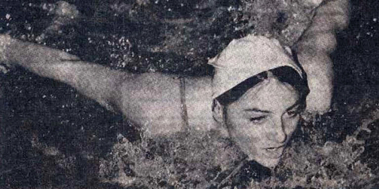 Newspaper photo of Jayma Meyer swimming