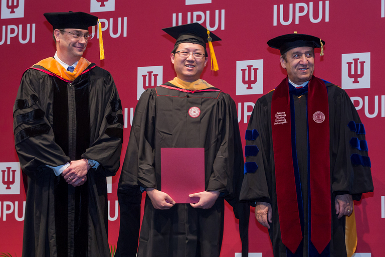 A student receives an award at the IUPUI Honors Convocation.