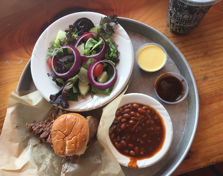 A sandwich and sides from City Barbecue