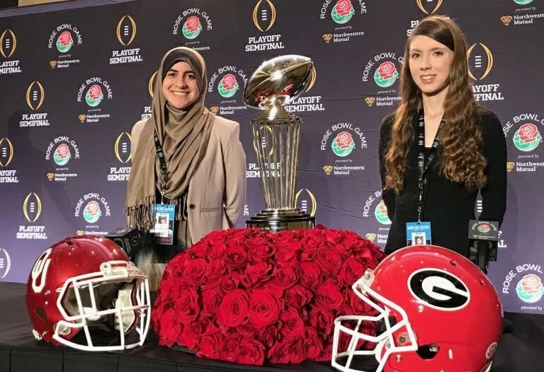 Sarah Bahr poses with a peer at the Rose Bowl.
