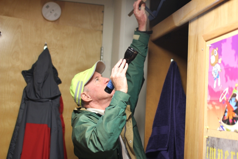 An IU employee checks a residence hall.