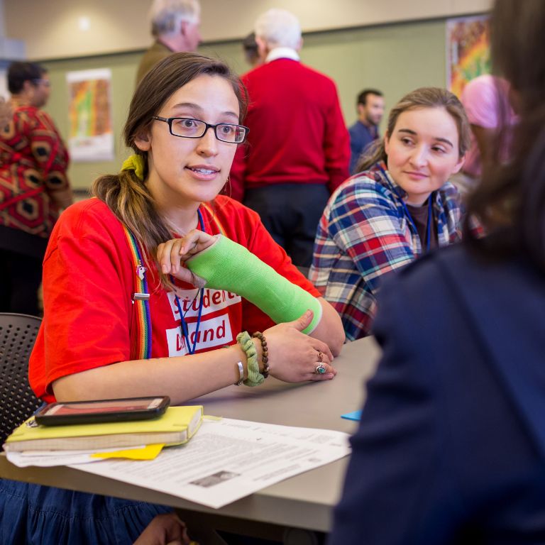 IUPUI students discuss sustainability issues at a table during 2018 Sustainability Summit