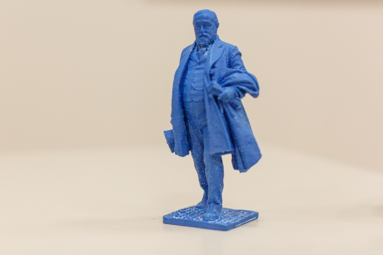 Small, blue, 3-D printed statue of President Benjamin Harrison