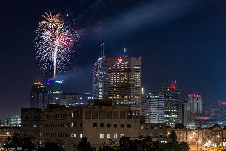 The downtown Indianapolis skyline is lit up by fireworks