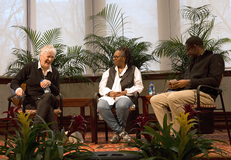 Glenn Close and Whoopi Goldberg speak to IU student George Hutchins. 