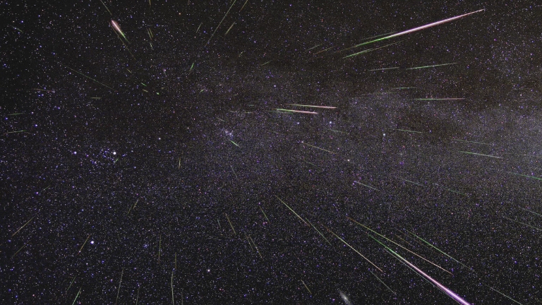 An outburst of Perseid meteors lights up the sky.