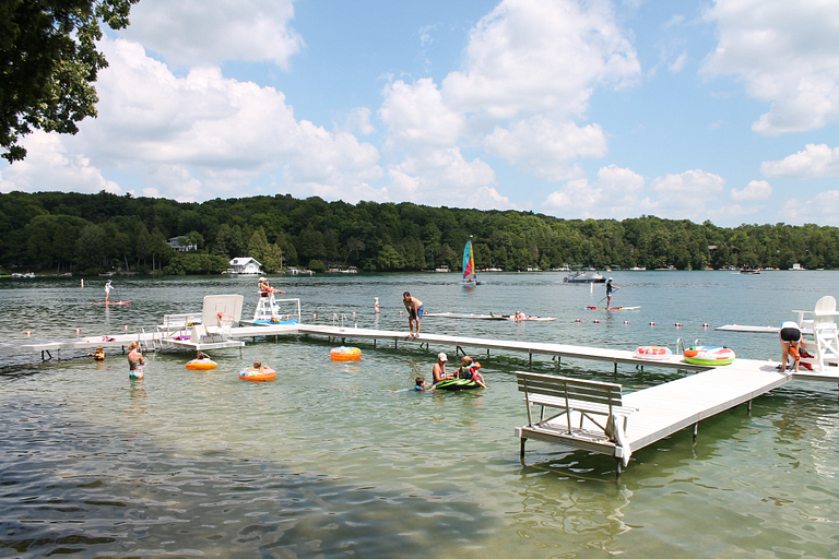 People playing on the pier at Camp Brosius