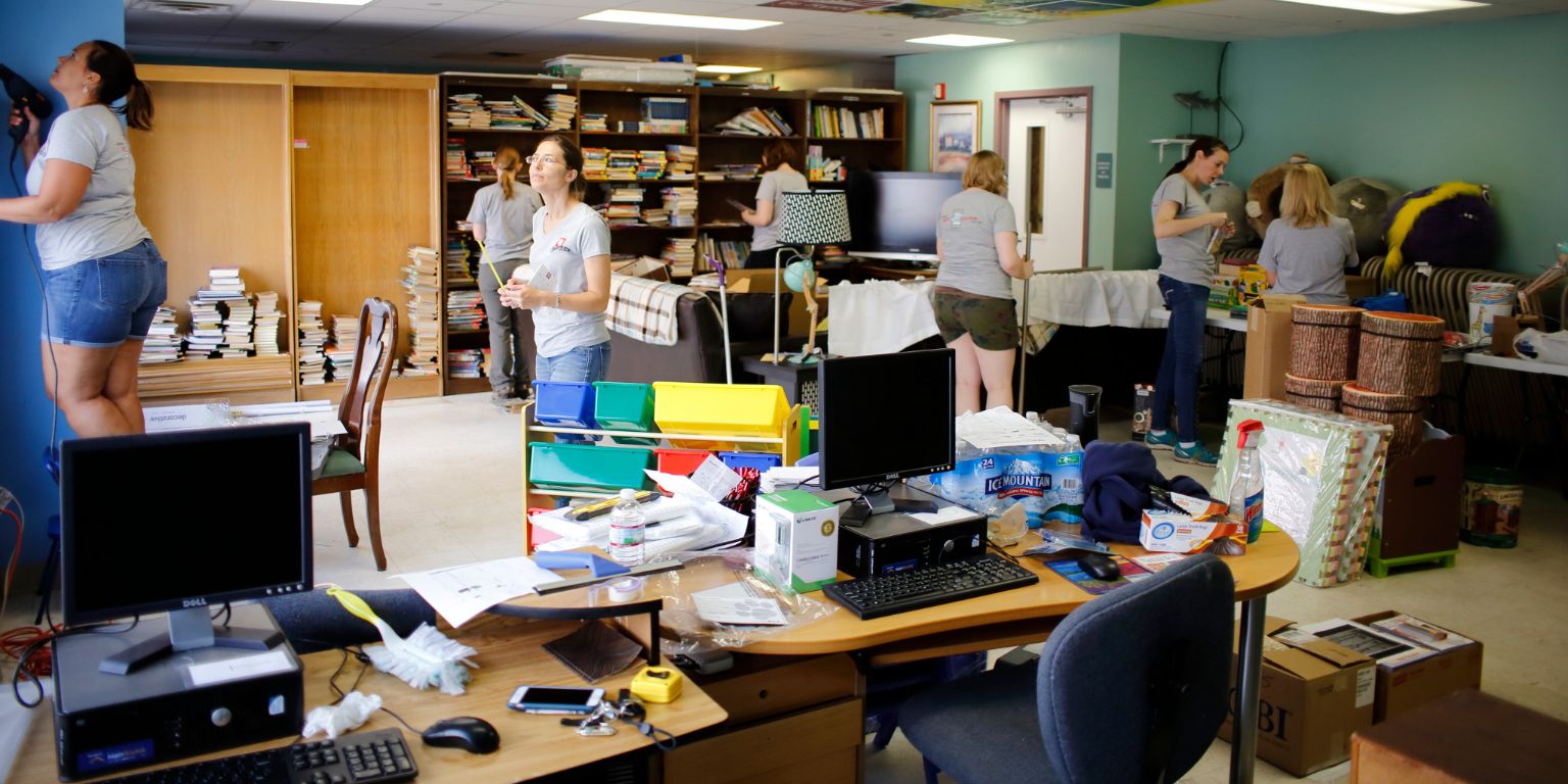 Librarians organize a library in a local shelter for women experiencing domestic violence