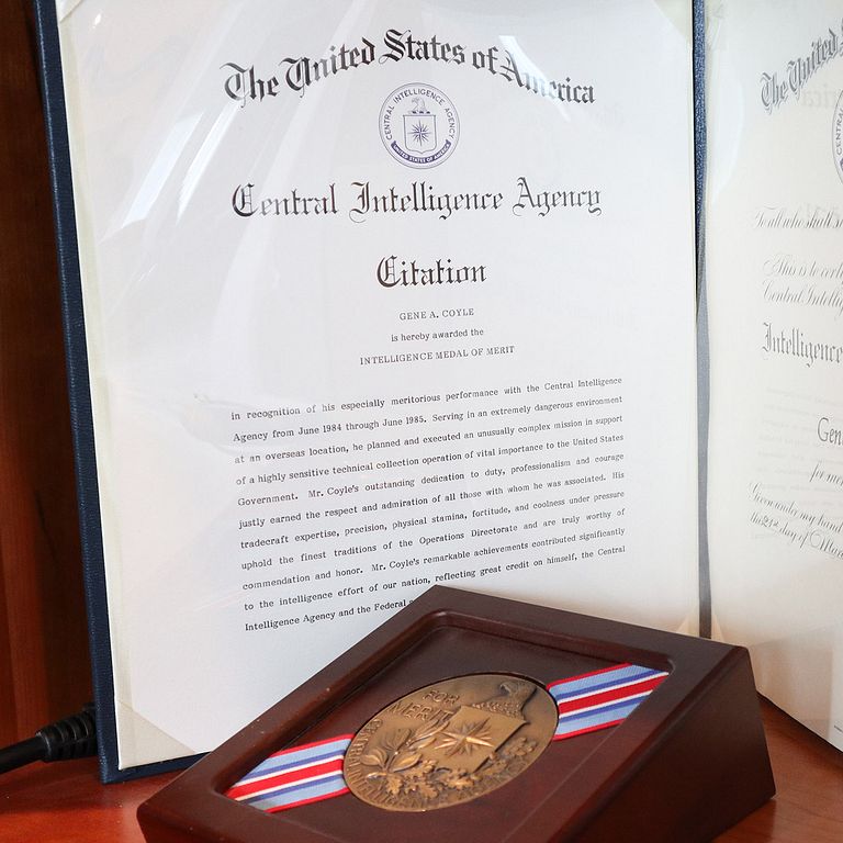 Gene Coyle's medal and certificate given to him by the CIA.