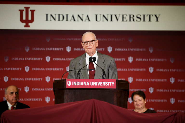 Lee Hamilton speaking from behind a lectern