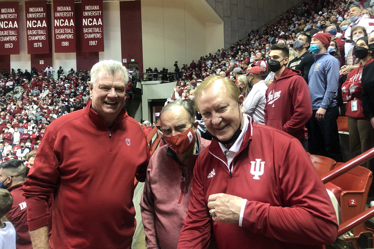 50-year season ticket holder Tom McGlasson with two friends at Simon Skjodt Assembly Hall