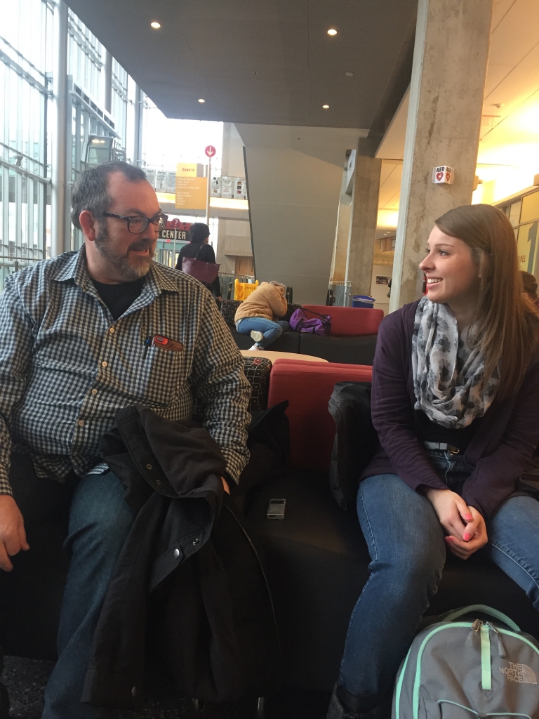 Russell Black and Kylie Knoblett sitting on a couch in the IUPUI Campus Center