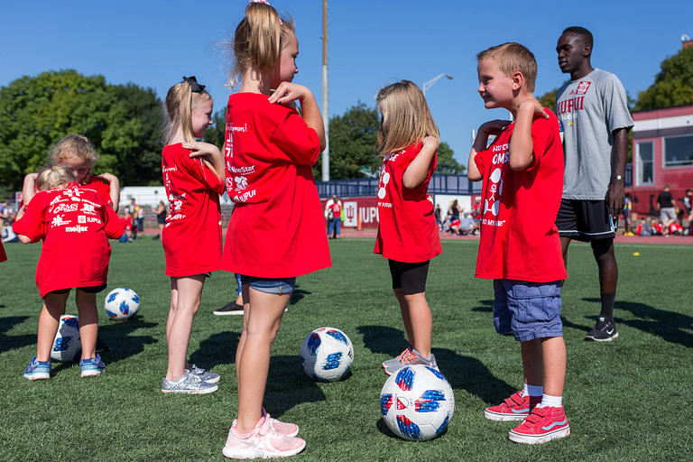 Kids get ready to play soccer