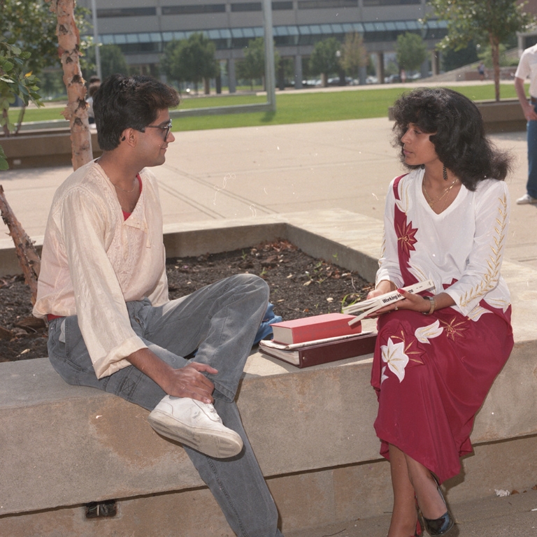 Two international students in Taylor Courtyard 