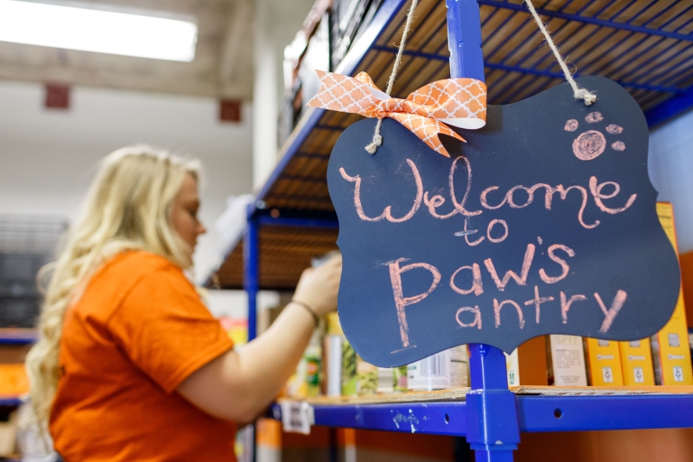 a sign that says Paws Pantry