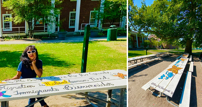 a female artist sits at picnic bench she painted