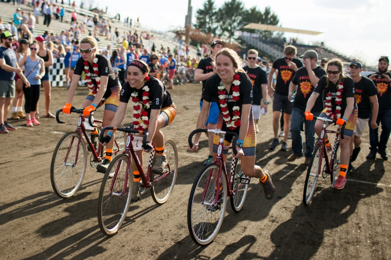 Team Phoenix enjoying a victory lap with fans after winning the 2016 women's Little 500