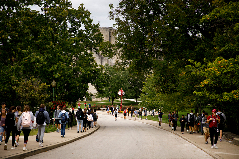 busy sidewalks filled with students walking to class