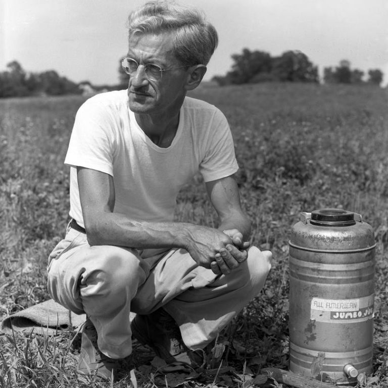 Glenn A. Black squats at Angel Mounds