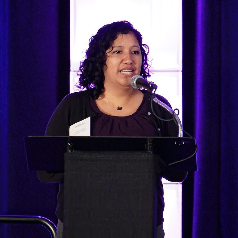 Karina GarduÃ±o speaks at a conference.