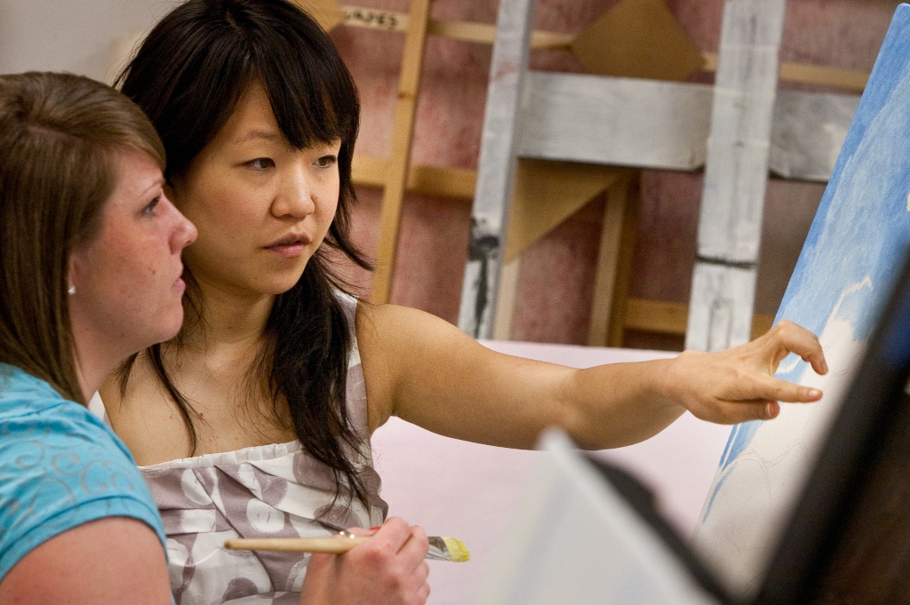 Ann Kim instructing a student