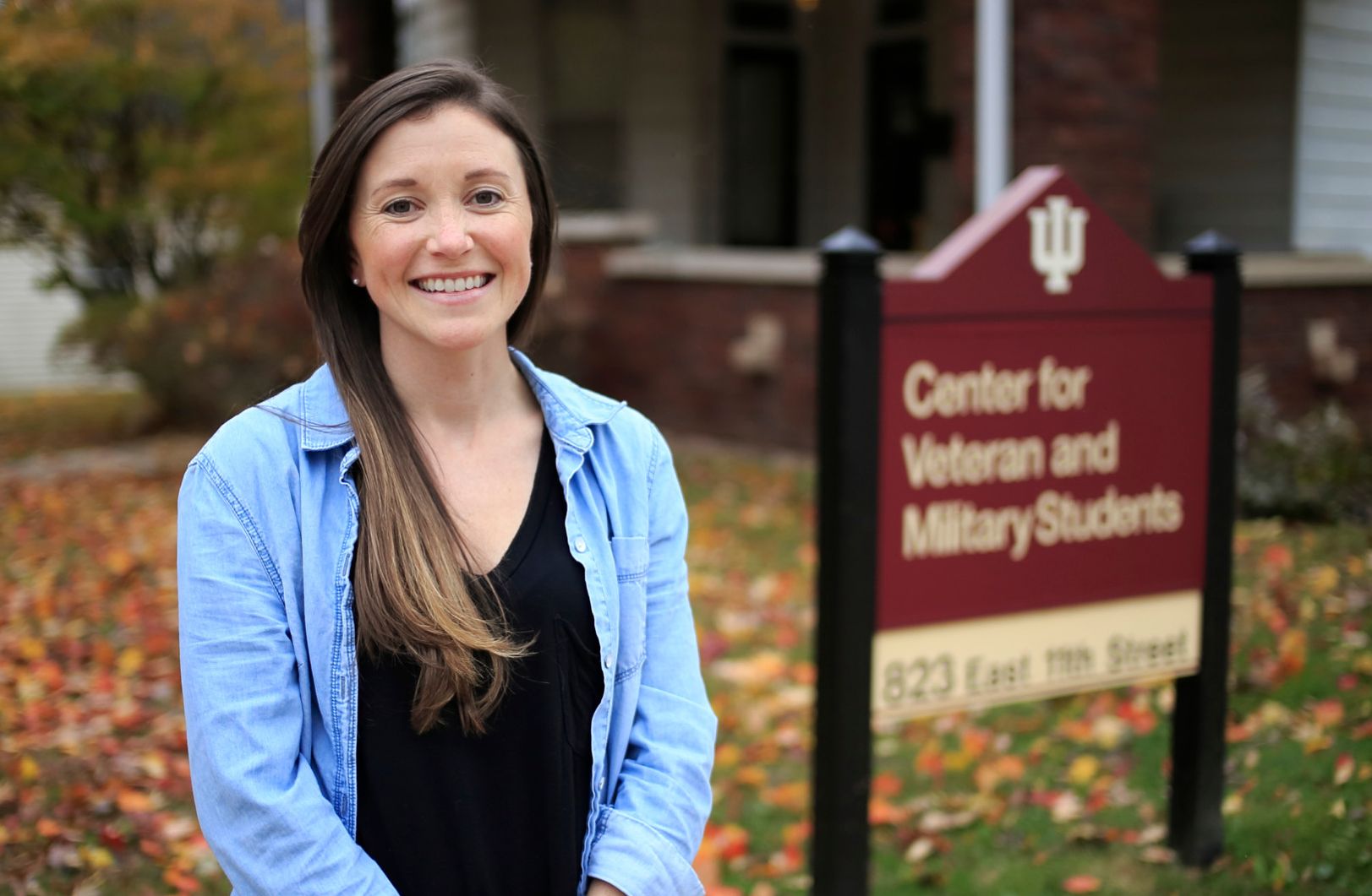 Sarah Bassett stands in front of the Center for Veteran and Military Students