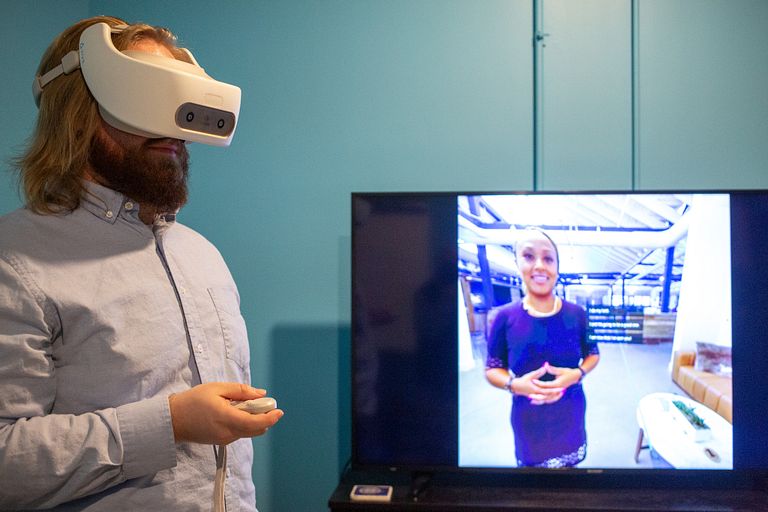 Regatta VR employee Devin Good loads a virtual reality simulation.