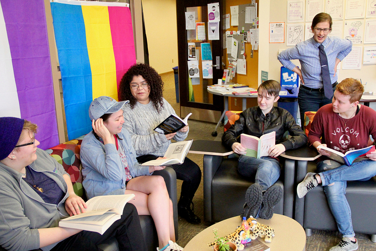 LGBTQ+ Center students enjoy books.