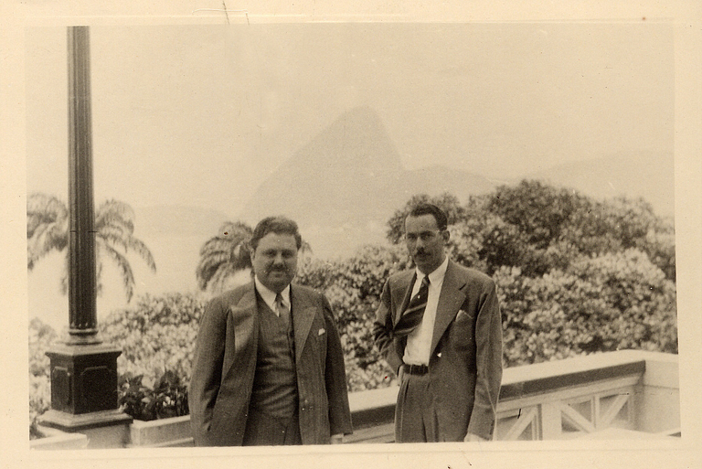 Herman B Wells standing with man in South America