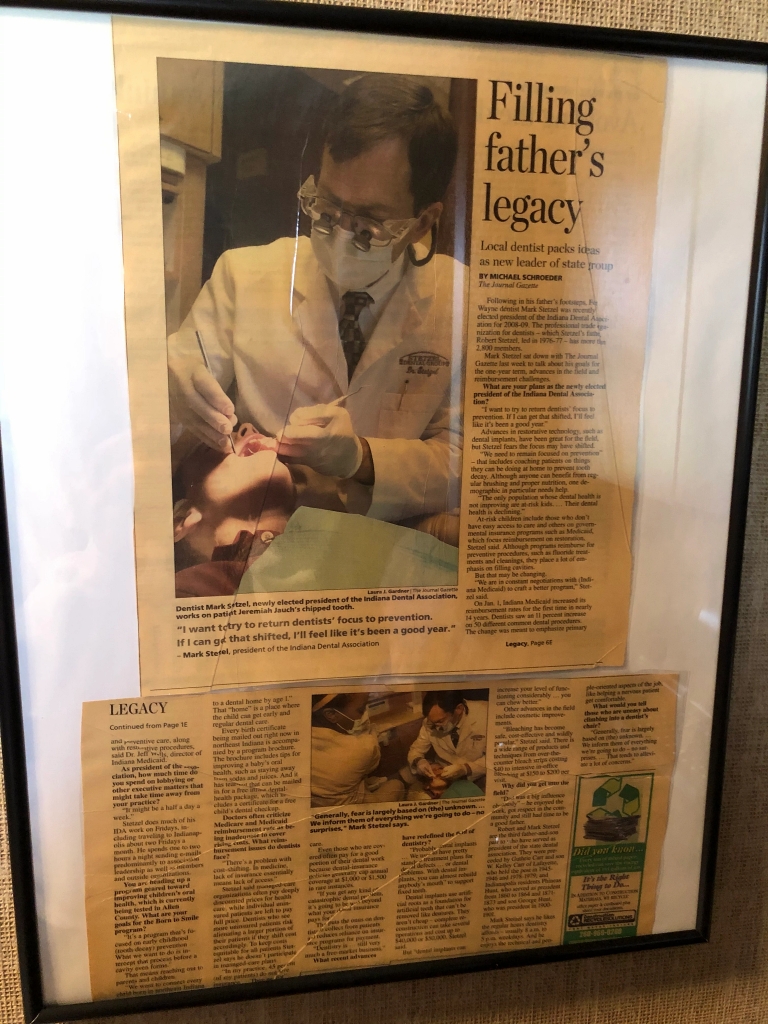 A framed newspaper article about Mark R. Stetzel.