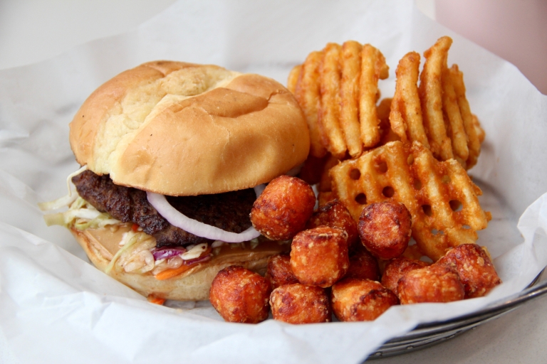 Burger, sweet potato tots and waffle fries from Punch Burger