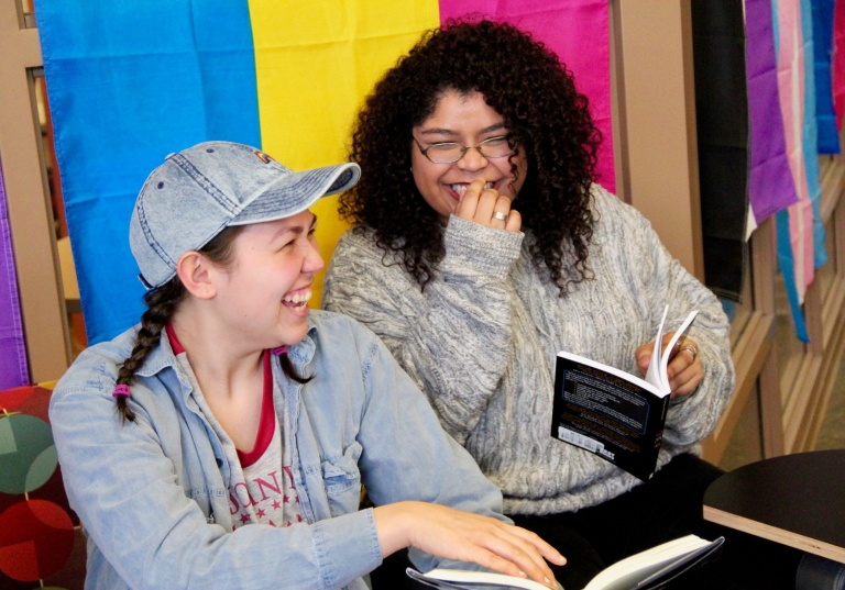 Students enjoying themselves in the LGBTQ+ Center.