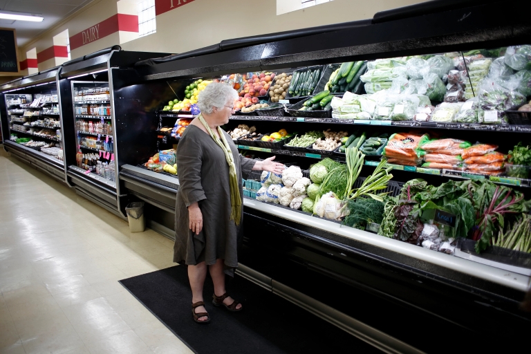 A woman shops at the Lost River Market in Paoli, Indiana