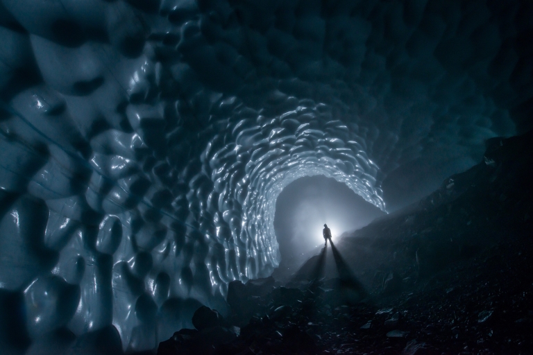 Expedition member James Frystak in the main passage of an ice cave
