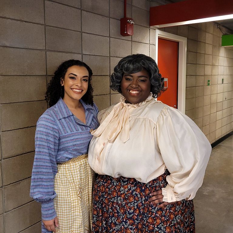 Actresses Chase Sanders and Maisah Outlaw pose backstage.