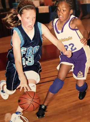 young McLimore playing basketball