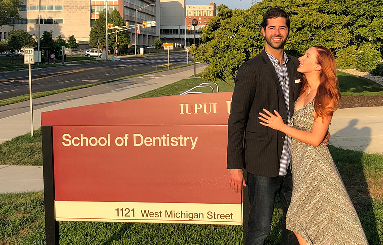 Evan Schmidt and Megan Daniels pose for a photo.